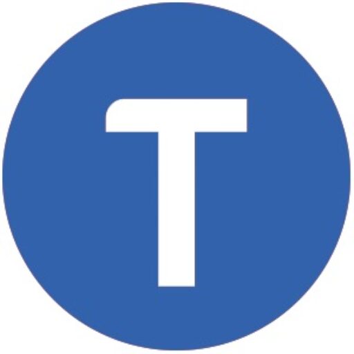 Ícone da Tachion, com um T maiúsculo branco em um círculo de fundo azul